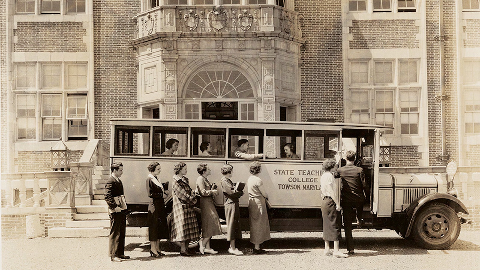 State Teacher College Bus with students 