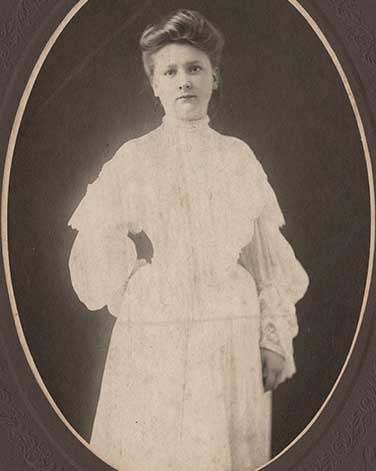 Theresa Wiedefeld in her graduation dress in 1904