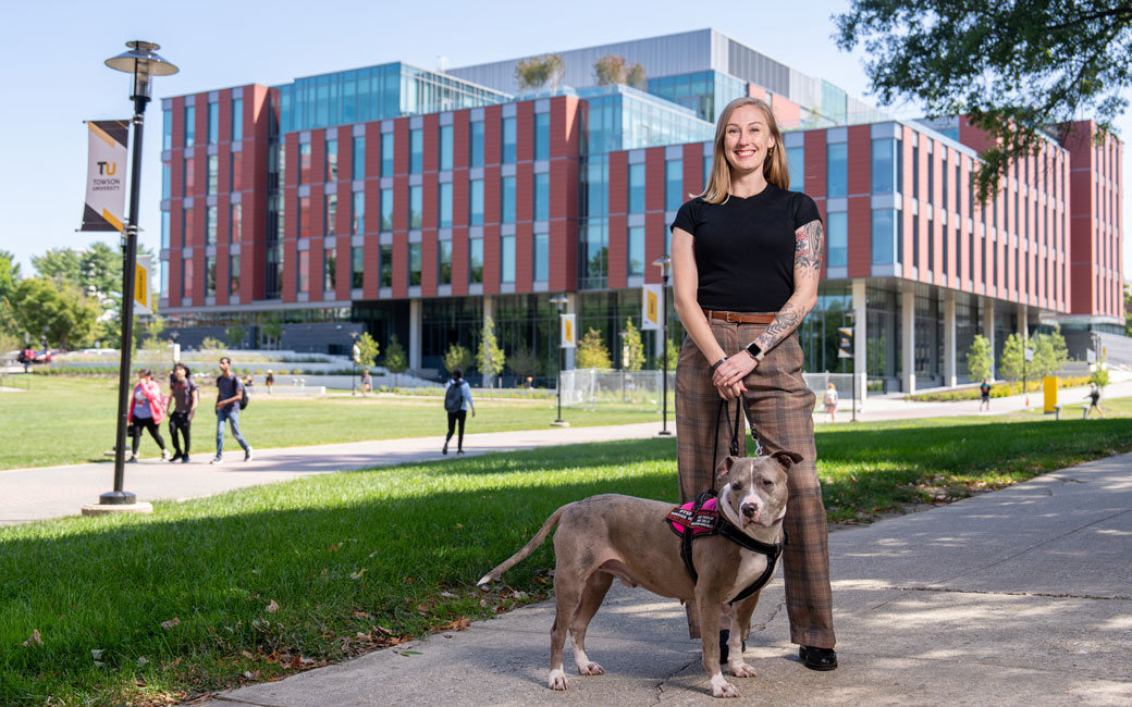 Marine veteran Tiffany Marsh with her service dog Roxy