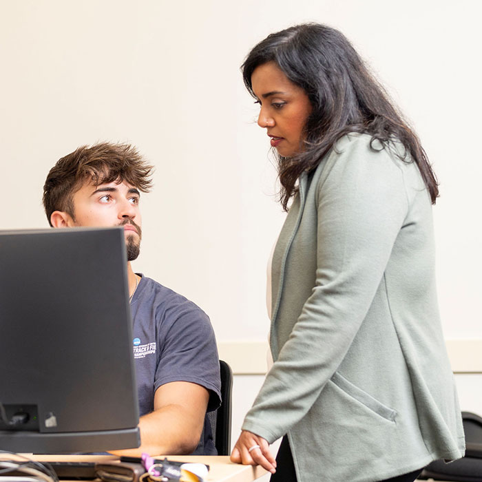 Stella Tomasi teaching a student