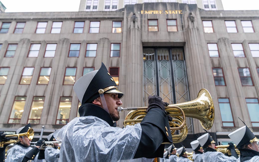 Brass player with empire state building in background