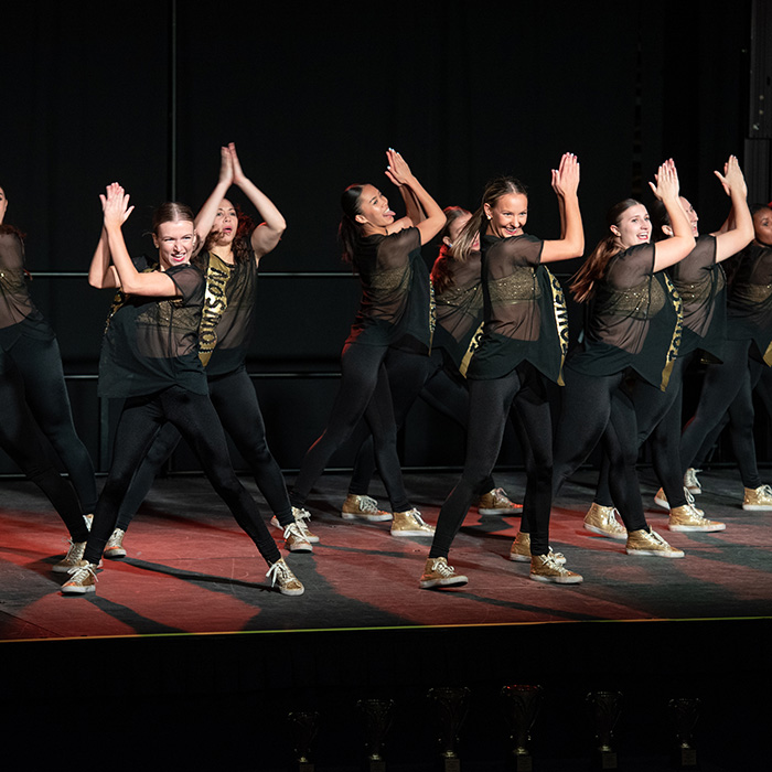 TU students dancing on stage